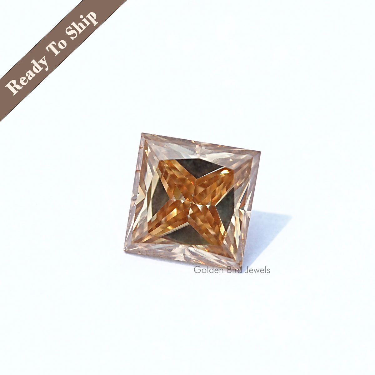 Princess-cut moissanite loose gemstone with golden faceted square center