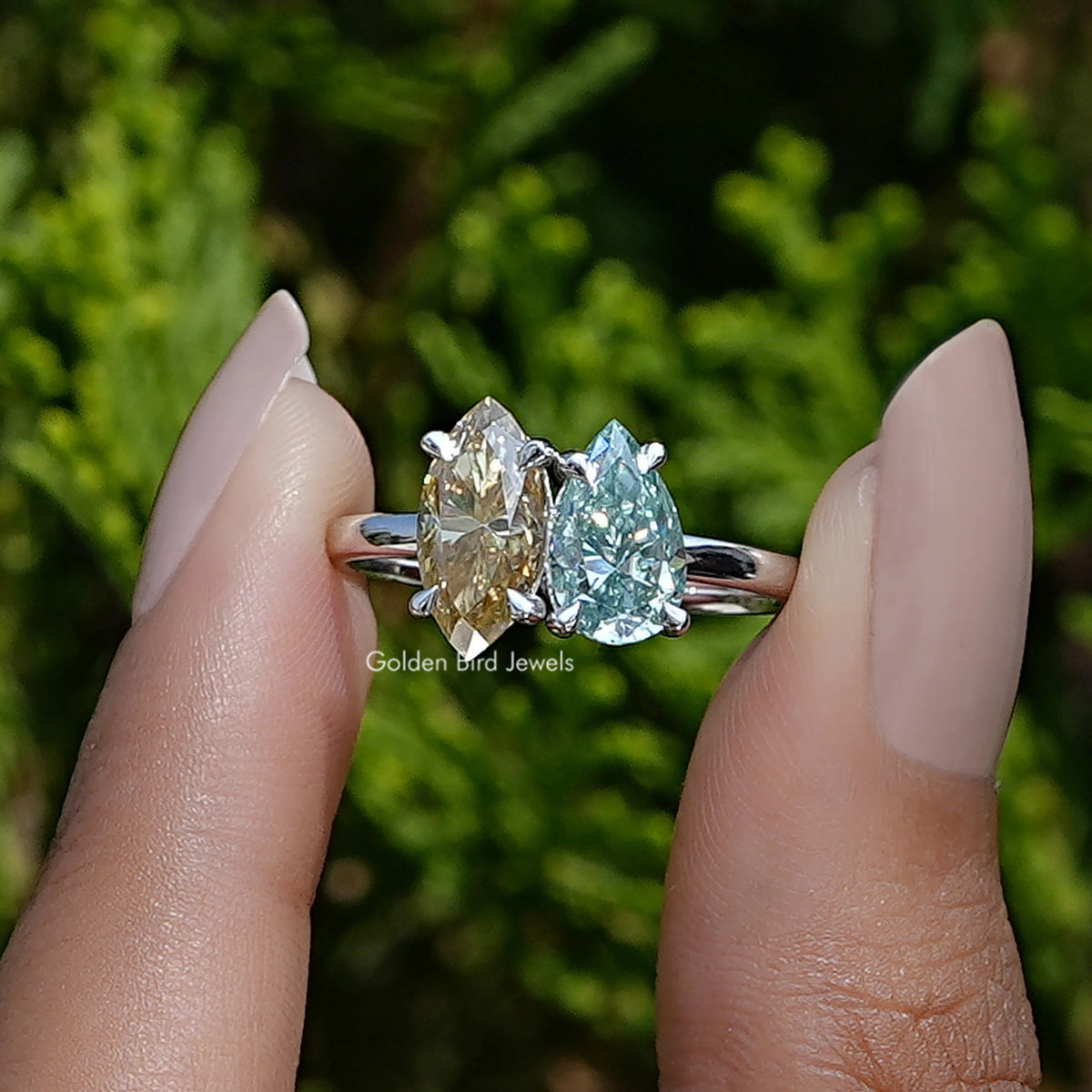 View of marquise and pear cut moissanite toi et moi Wedding Ring 