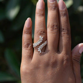 Close-Up View of Bypass Set Marquise Cut Wedding Ring In Yellow Gold       