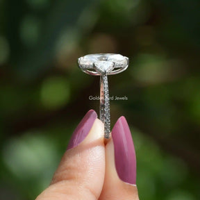 Side View of Marquise Cut Moissanite Hidden Halo Ring In two fingers