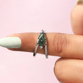 In finger front View of Marquise And Round Cut Split Shank Ring