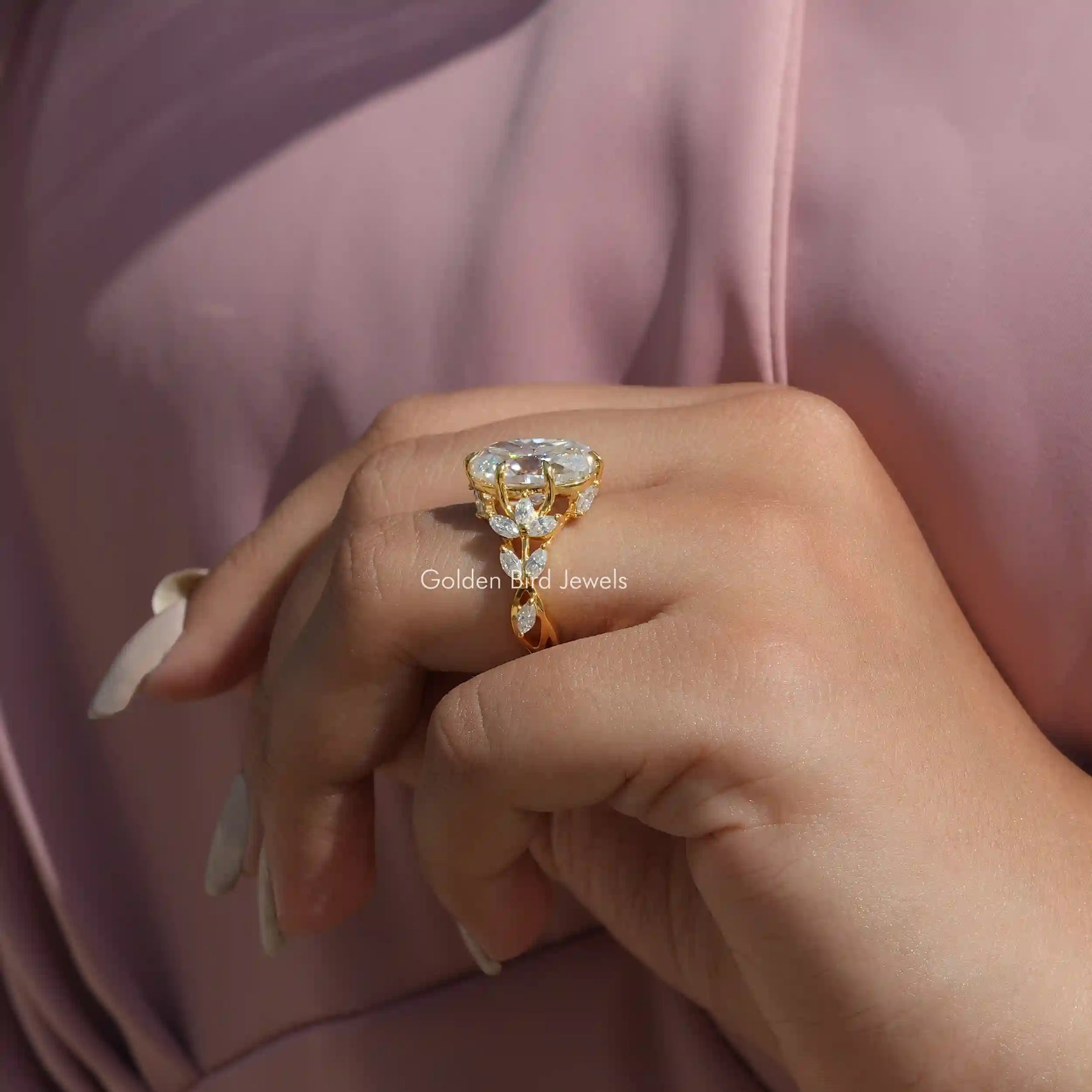 Detailed View Of Marquise Oval Cut Moissanite Ring In Yellow Gold