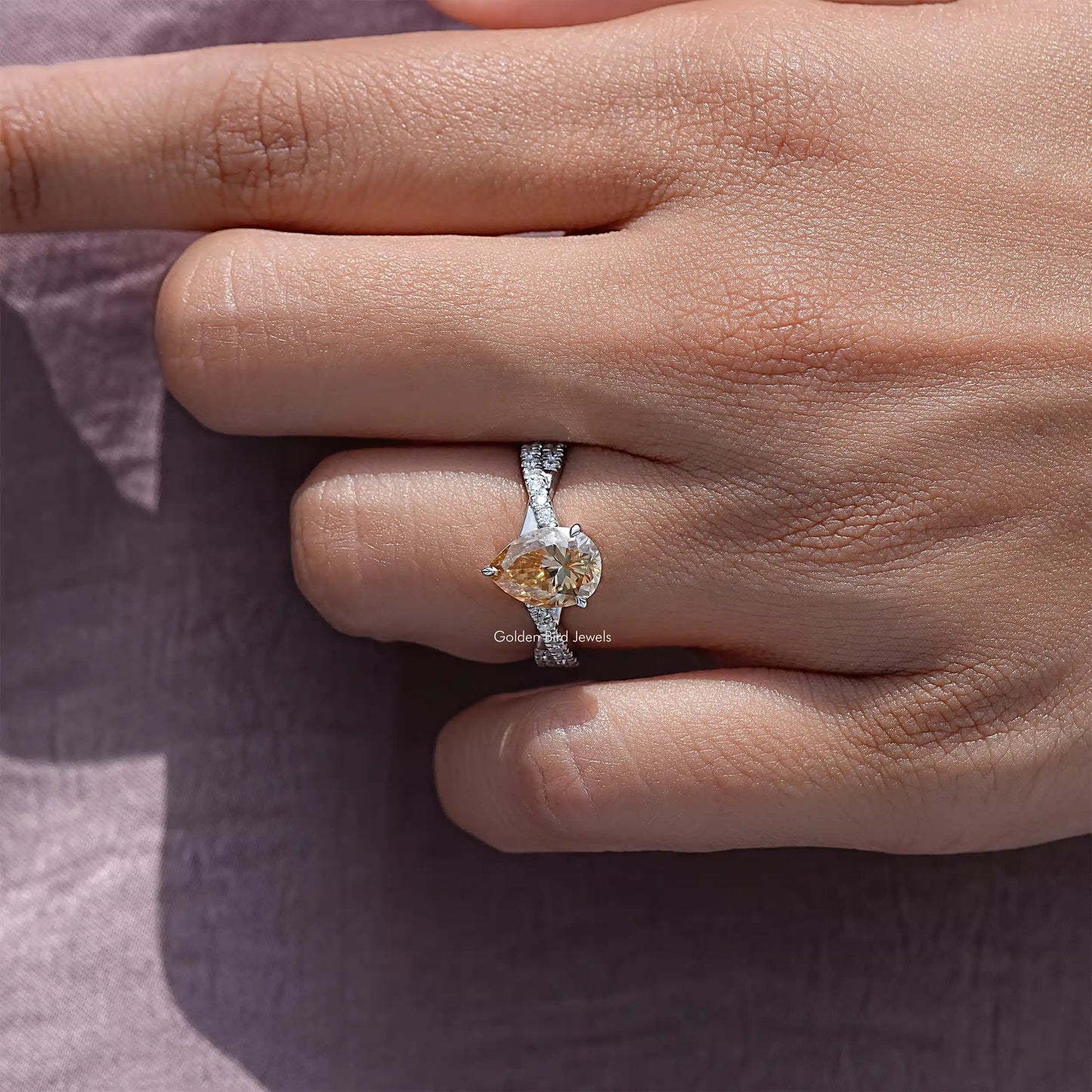 Pear Moissanite Gemstone Twisted Shank Accent Ring