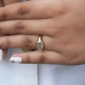 View of Oval Cut Moissanite Engagement Ring In Yellow Gold