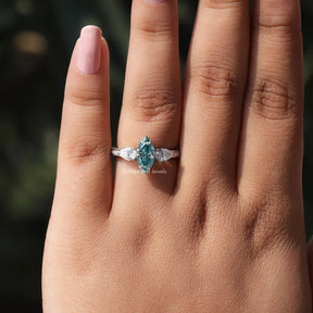 Detailed View Of Moissanite Blue Marquise And Pear Cut Ring In White Gold