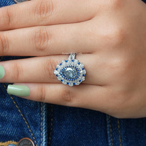 View of Pear Cut Halo Moissanite Engagement Ring In White Gold