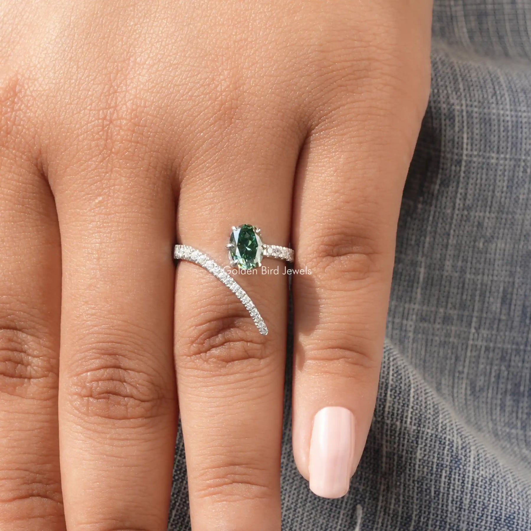 View of Green Oval Cut Moissanite Ring In finger