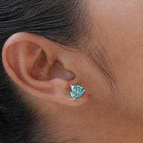 In ear view of  Trillion Cut Moissanite Studs