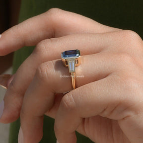 Side View of Emerald Cut Bezel Set Ring In finger