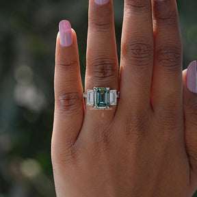 Detailed View Of Blue Green Emerald Cut 3 Stone Ring