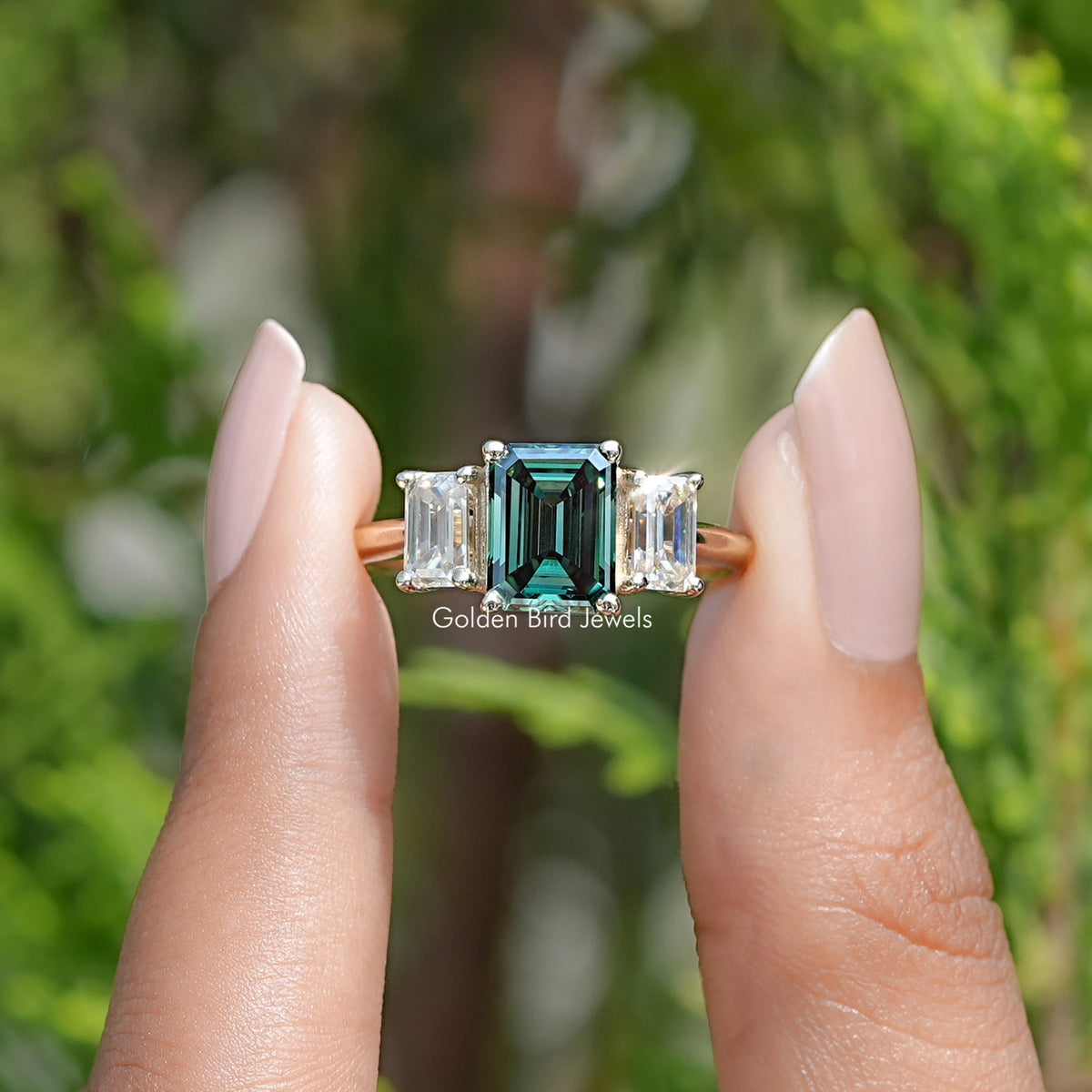 Front view of Moissanite Emerald Cut 3 Stone Ring
