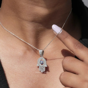 Detailed view of moissanite eye shape pendant In White Gold