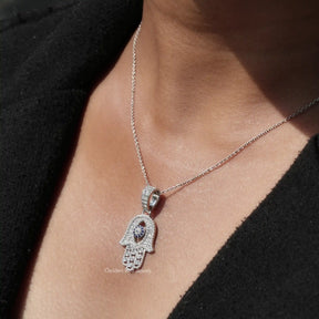 In front view of moissanite eye cut pendant in wear's 