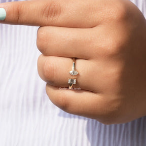 top view of Toi et moi multi-shaped moissanite  engagement ring in yellow gold 
