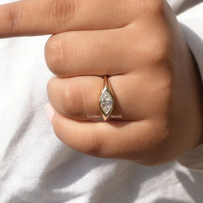 Top view of  moissanite engagement ring in marquise cut for women