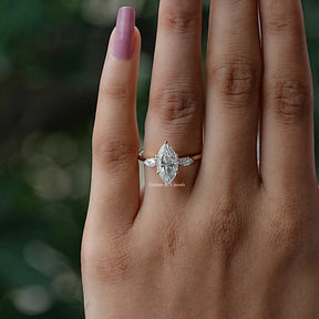 View of Marquise Cut Three Stone Engagement Ring In Finger