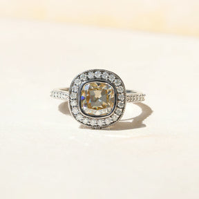 View of Yellow Cushion Cut Bezel Set Ring In finger