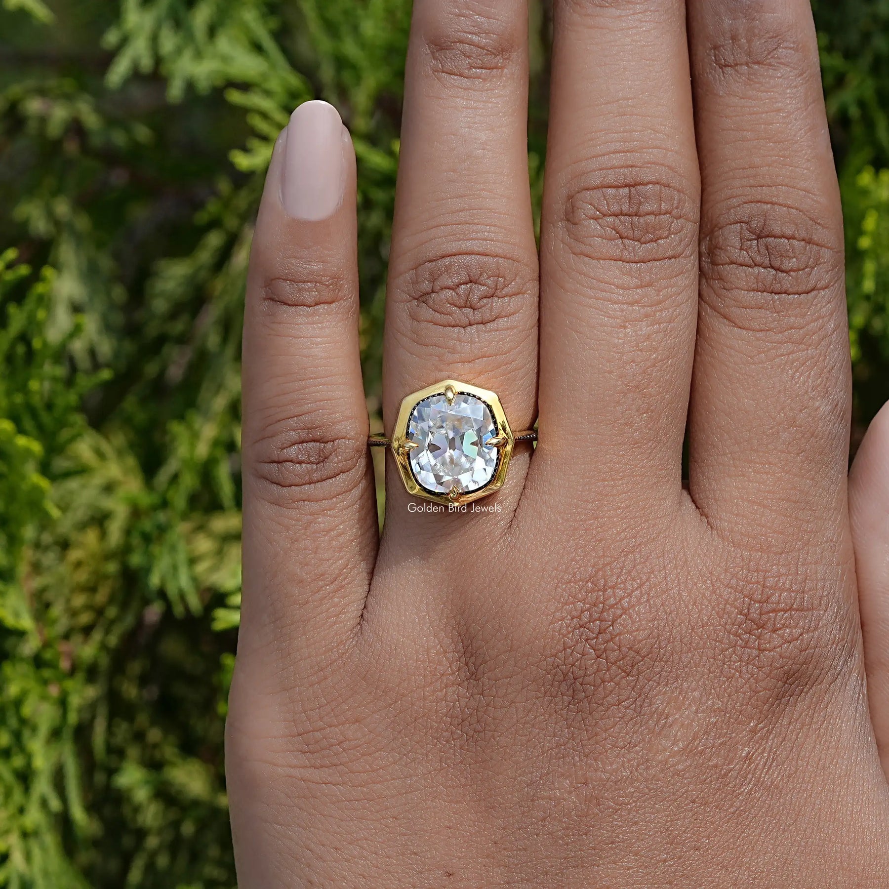 In Finger view of cushion cut moissanite halo Ring  
