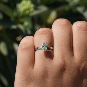 Close-Up View of Solitaire Cushion Cut Moissanite Ring In White Gold