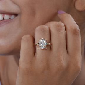 View of OElongated Cushion Cut Moissanite Engagement Ring In Finger
