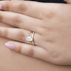 View of Moissanite Oval Cut Hidden Halo Ring Set In Finger