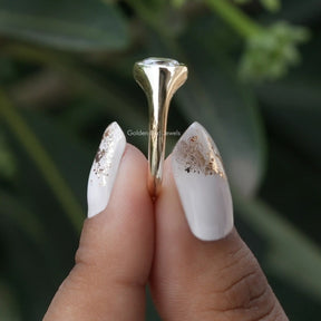 Side View of Rose Cut Oval Moissanite Engagement Ring In two fingers