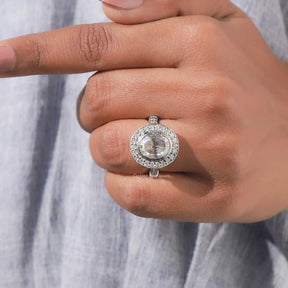 Close-Up View of Oval Cut Moissanite Halo Engagement Ring In White Gold
