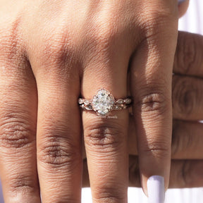 Close-Up View of Oval Cut Moissanite Wedding Ring In Yellow Gold