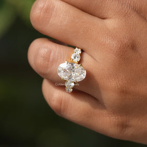 View of Oval And Round Cut Ring Set In Four Prong set In finger