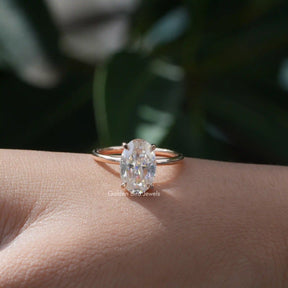 Detailed View Of Oval Cut Moissanite Solitaire Ring In Yellow Gold