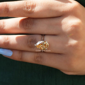 View of Moissanite Pear Cut Solitaire Wedding Ring In Yellow Gold