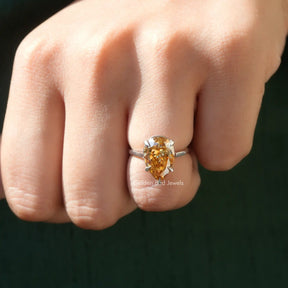 View of Pear Cut Solitaire Moissanite Wedding Ring In Finger