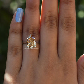 Pear Cut Moissanite Solitaire Ring In Yellow Gold