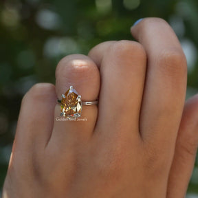View of Pear Cut Moissanite Solitaire Wedding Ring In Finger