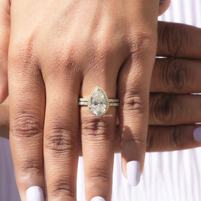 Detailed View Of Pear Cut Moissanite Engagement Ring In Yellow Gold
