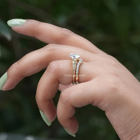 Side View of Moissanite Round Cut Engagement Ring In fingers
