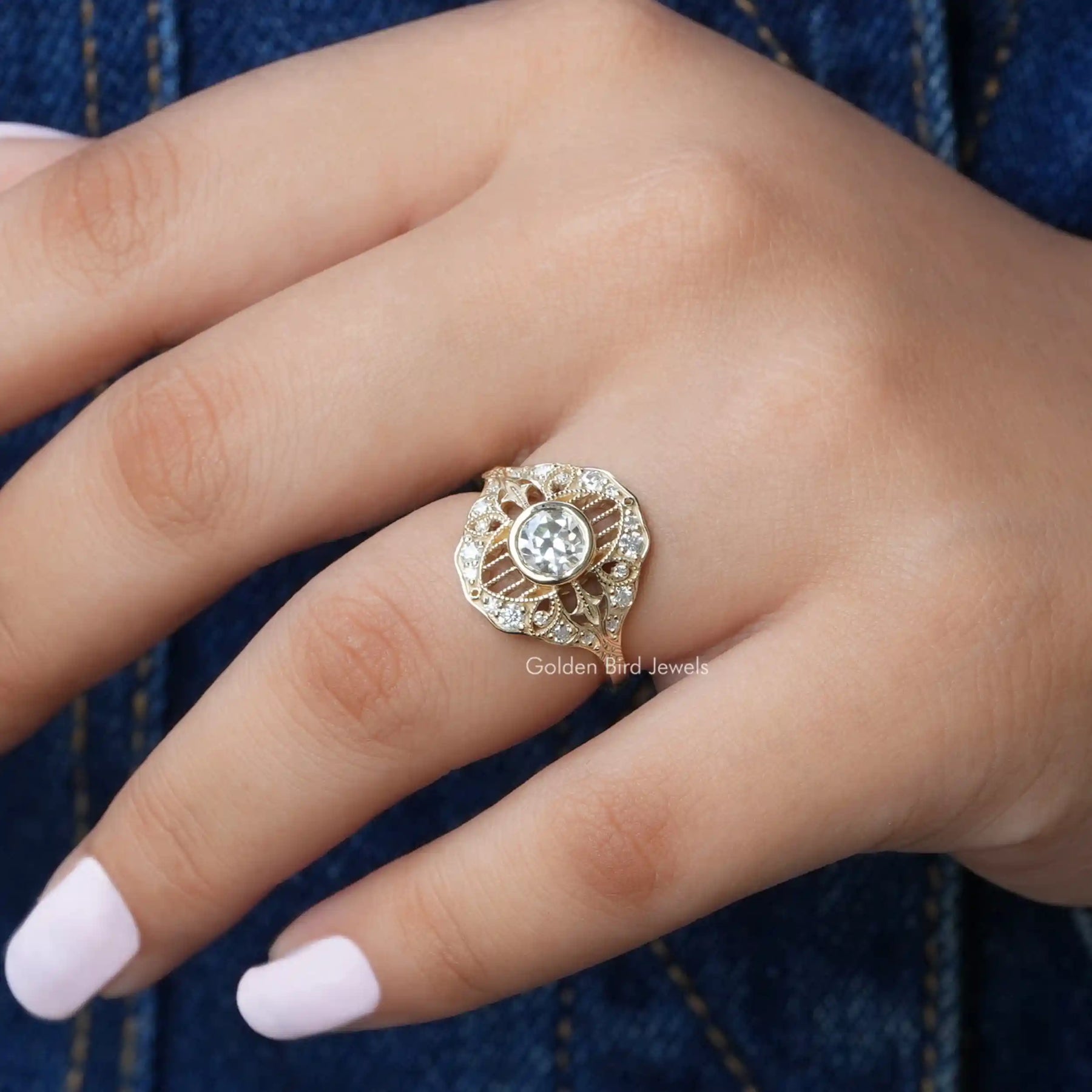 View of Round Cut Moissanite Engagement Ring In Finger