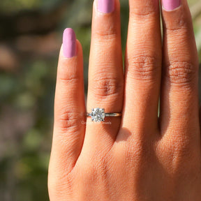 View of Solitaire Round Cut Moissanite Ring In White Gold