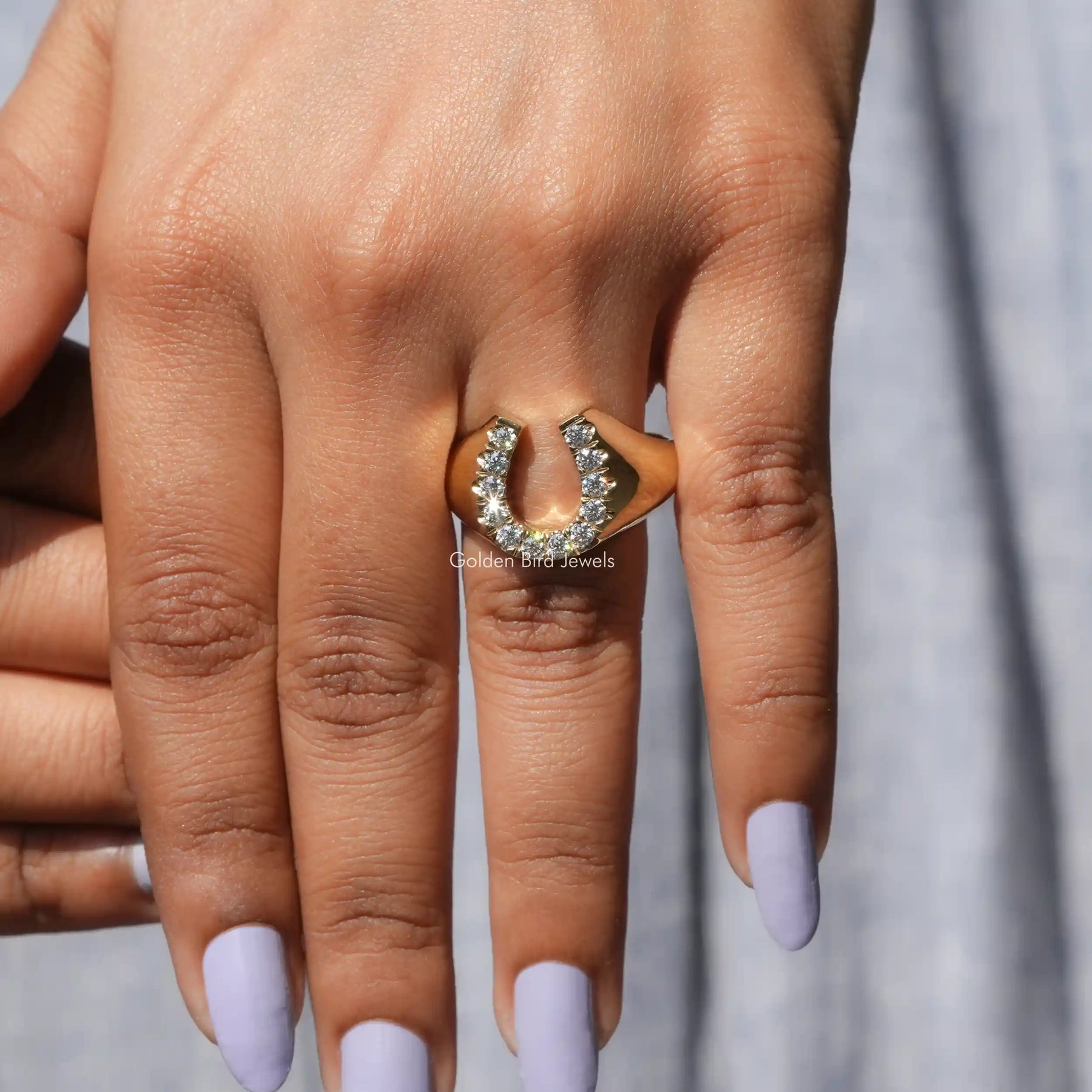 Close view of moissanite ring in secure setting