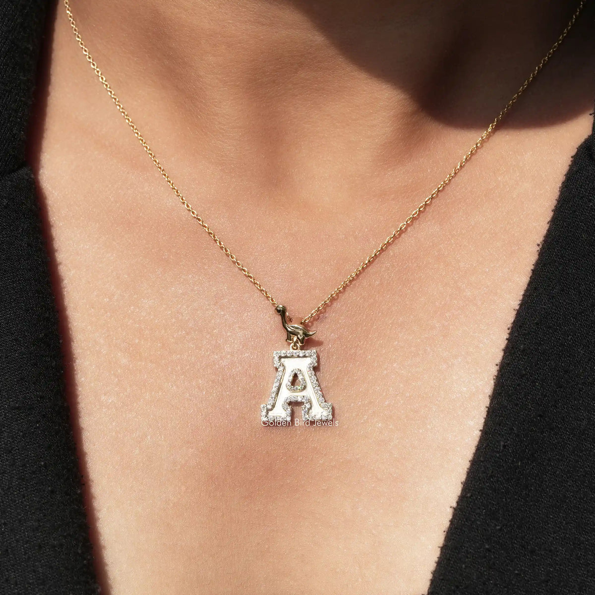 View of round cut A letter moissanite  pendant 