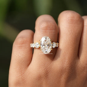 Close-Up View of Oval Cut Solitaire Accent Stone Ring In Yellow Gold