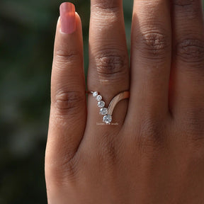 Close-Up View of Round Cut V Shaped Chevron Ring In Yellow Gold        