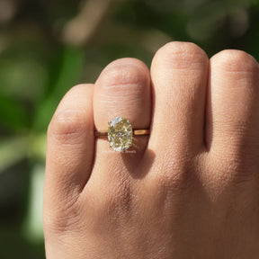 Oval Cut Moissanite Engagement Ring In finger