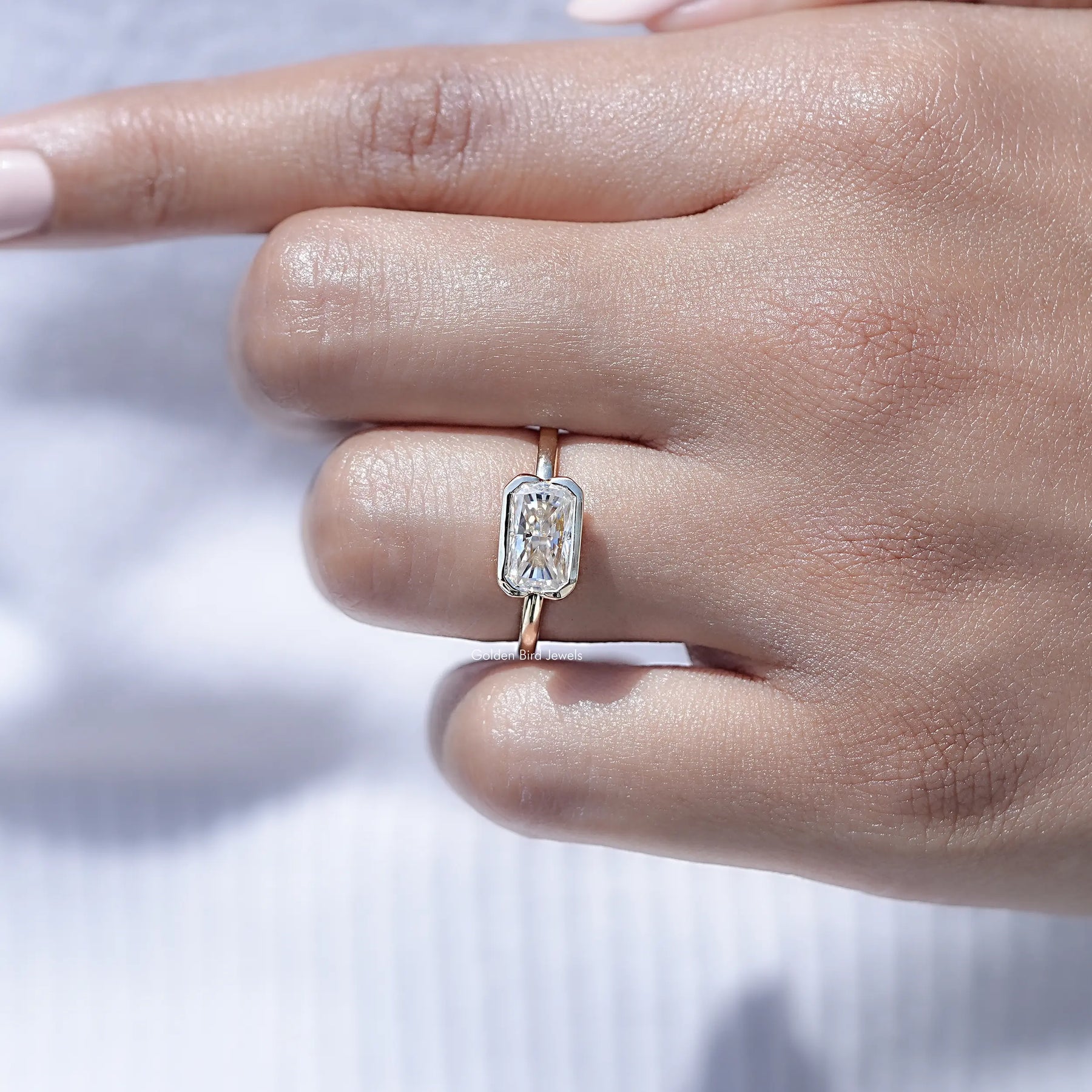 View of Radiant Cut Moissanite Solitaire Ring in prongs setting 