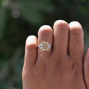 Three Stone Yellow Radiant Moissanite Ring In White Gold