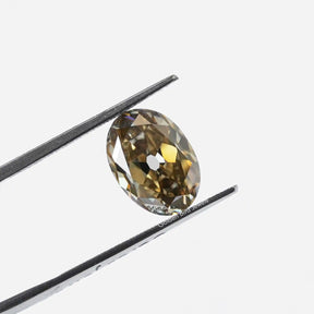 Tweezer view of Oval Cut Loose Moissanite Stone