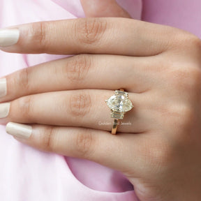 Close view of  moissanite baguette and moval  cut ring 