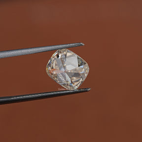 In Tweezer View Of Moissanite Old Mine Cushion Cut Loose Stone