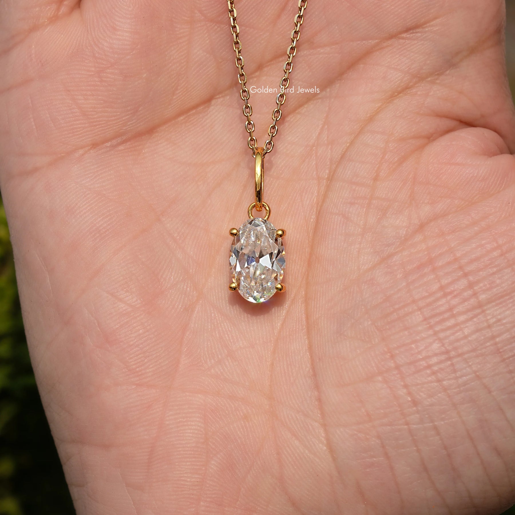Close View Of Old Mine Oval Moissanite Pendant in Secure Setting 