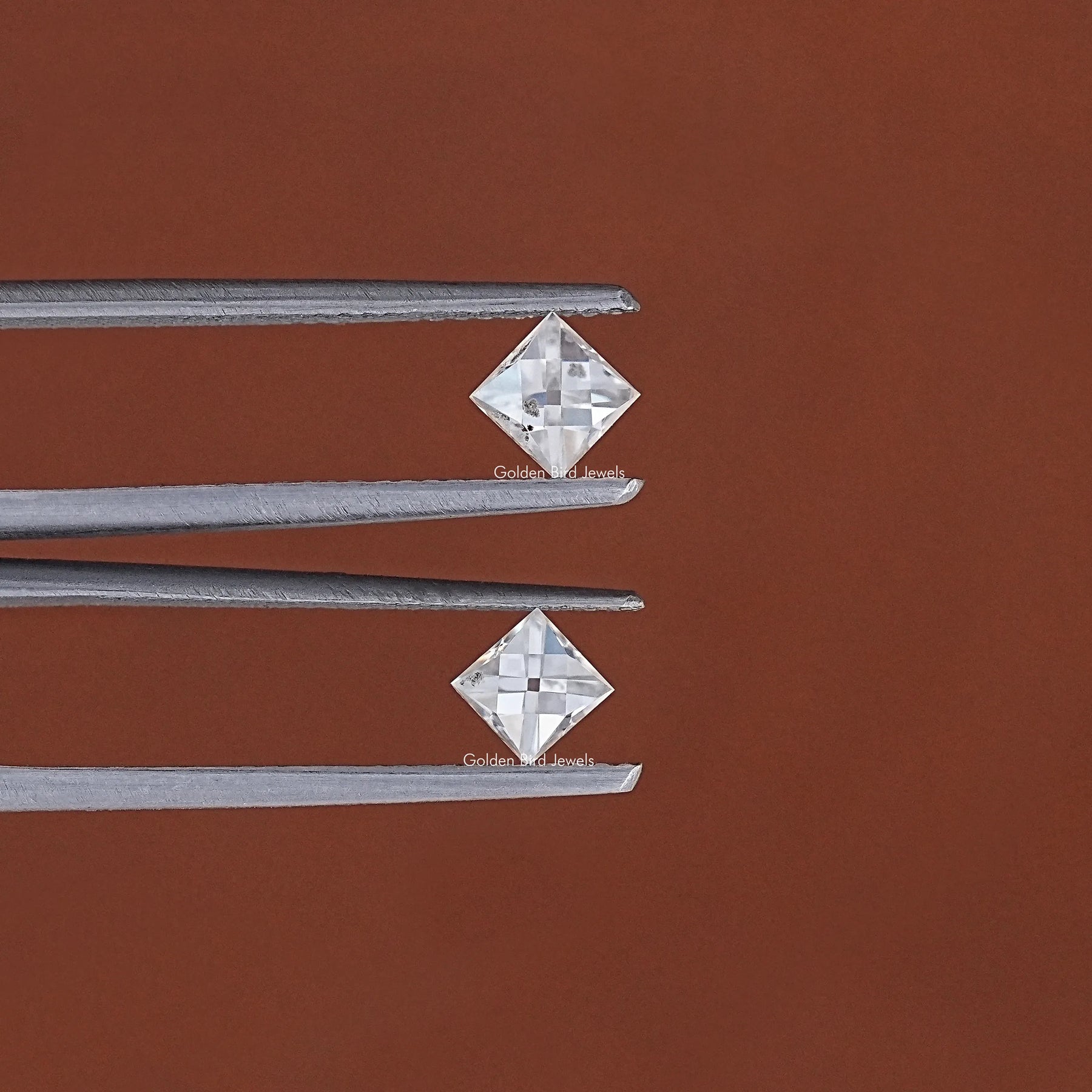 In Tweezer View Of Off White French Cut Loose Moissanite Pair